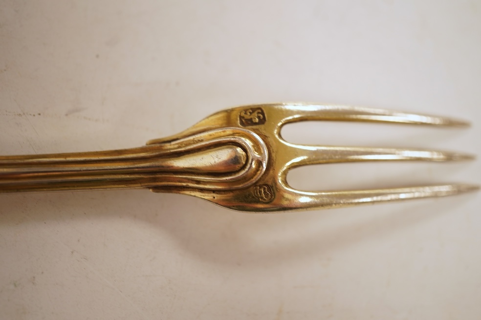 A collection of assorted mainly 18th century silver three pronged table forks, including a pair of dog nose, 19.1cm, most with indistinct or rubbed marks, together with a similar collection of thirteen silver three prong